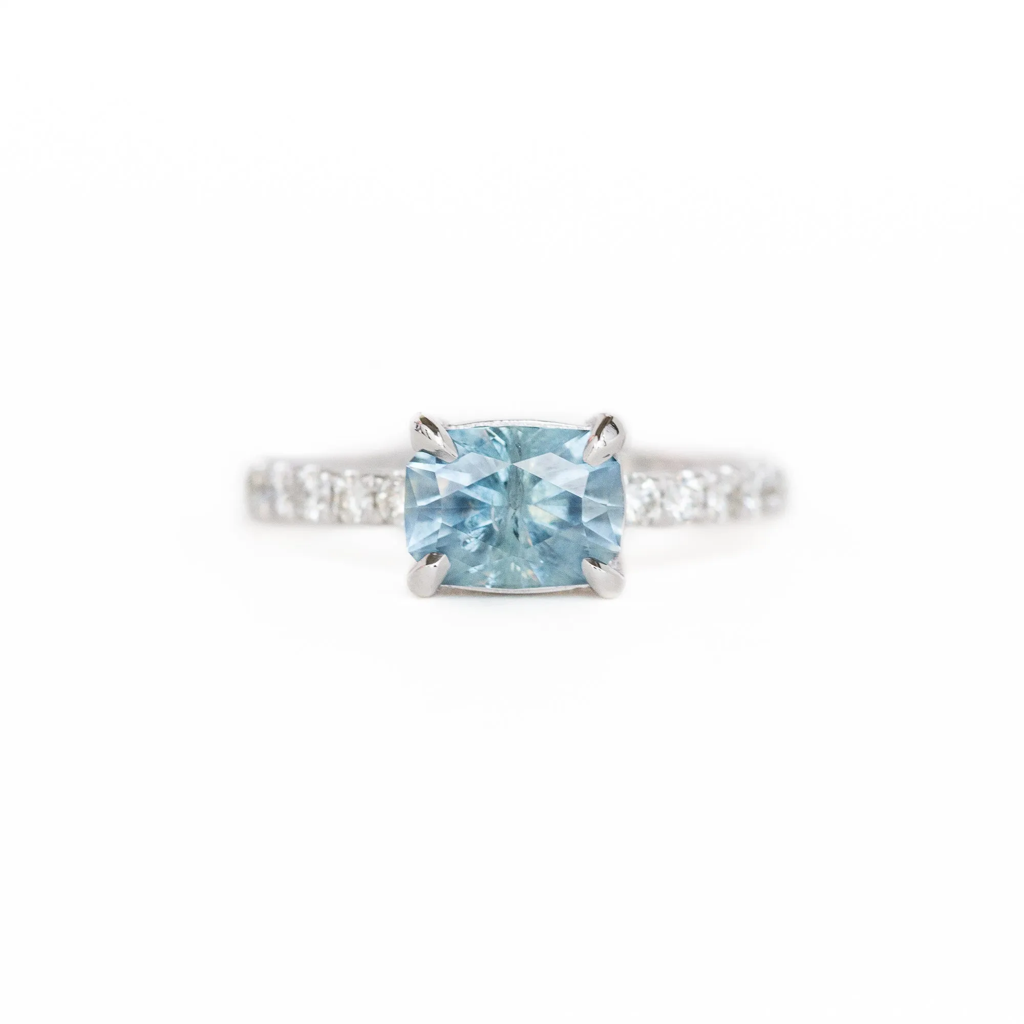 1.75ct East-West Radiant Cut Montana Sapphire with Diamond Band in 14k White