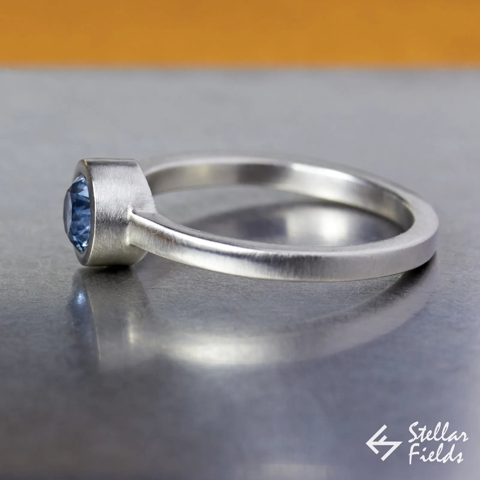 Blue Montana Sapphire Bezel Engagement Ring