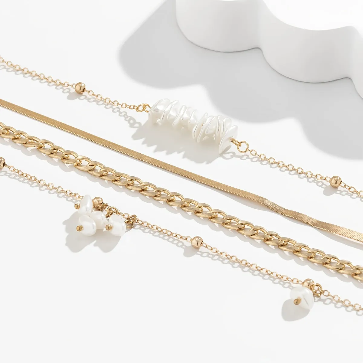 Get Ready to Shine with our 4pcs Irregular Pearl Tassel Necklace Set - Perfect for Parties and Casual Wear