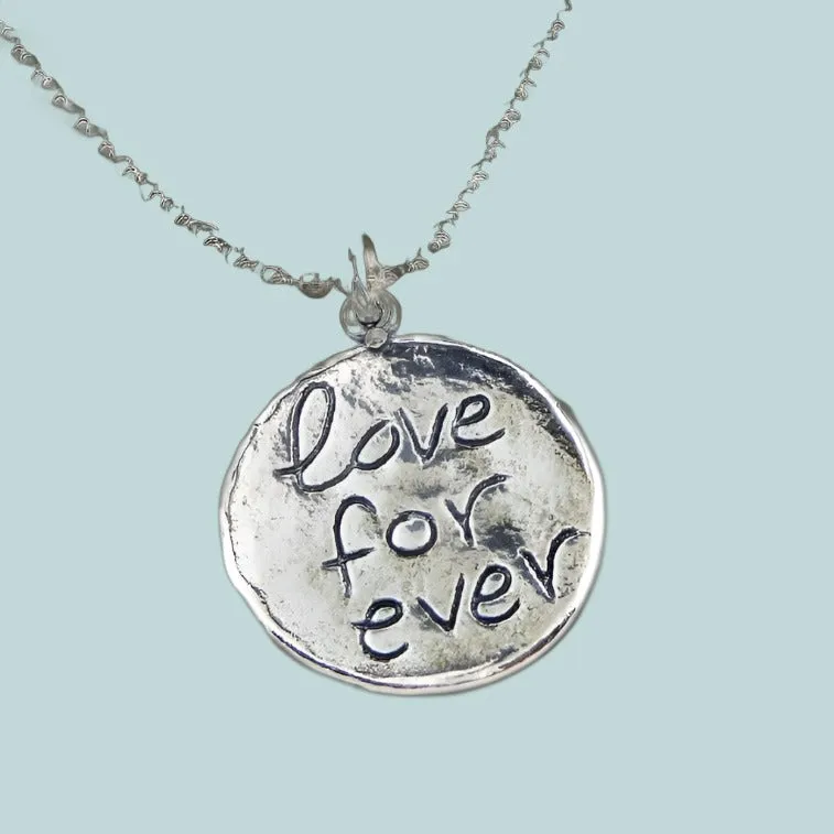 Silver chain with a Love forever pendant. Necklaces for women.